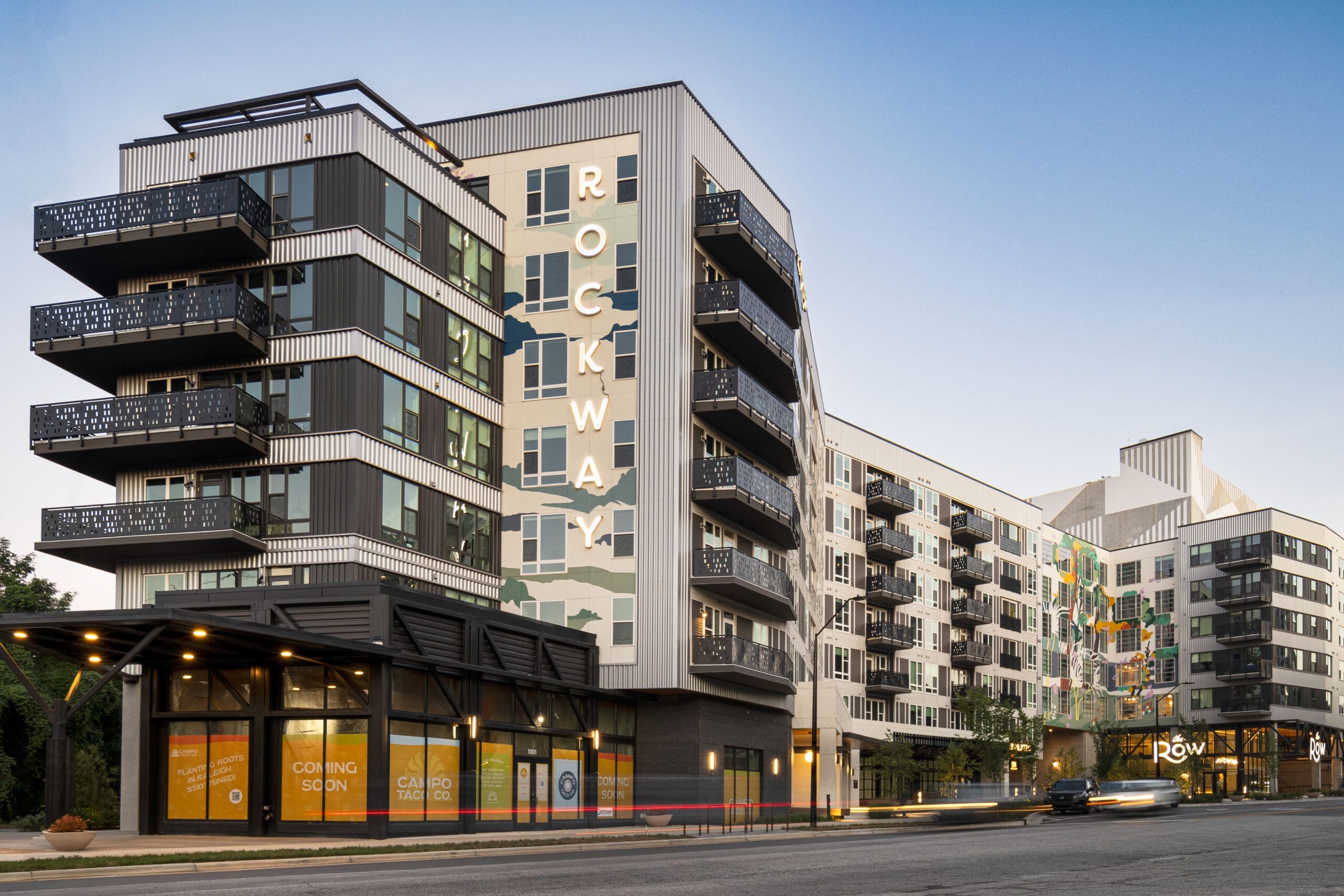 exterior of row building with retail below